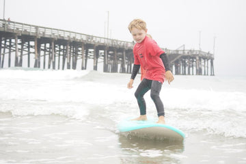 Catch Their First Wave: Tips for Teaching Kids to Surf